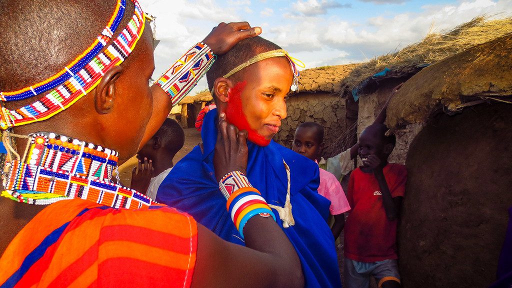 Kenyan Woman Red Face Paint